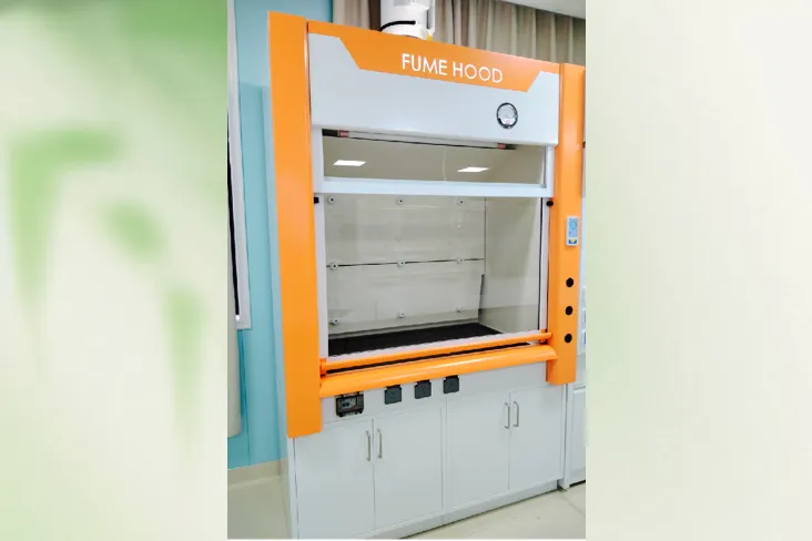 Installed orange and white arc-shaped fume hood with raised glass sash and white base cabinets