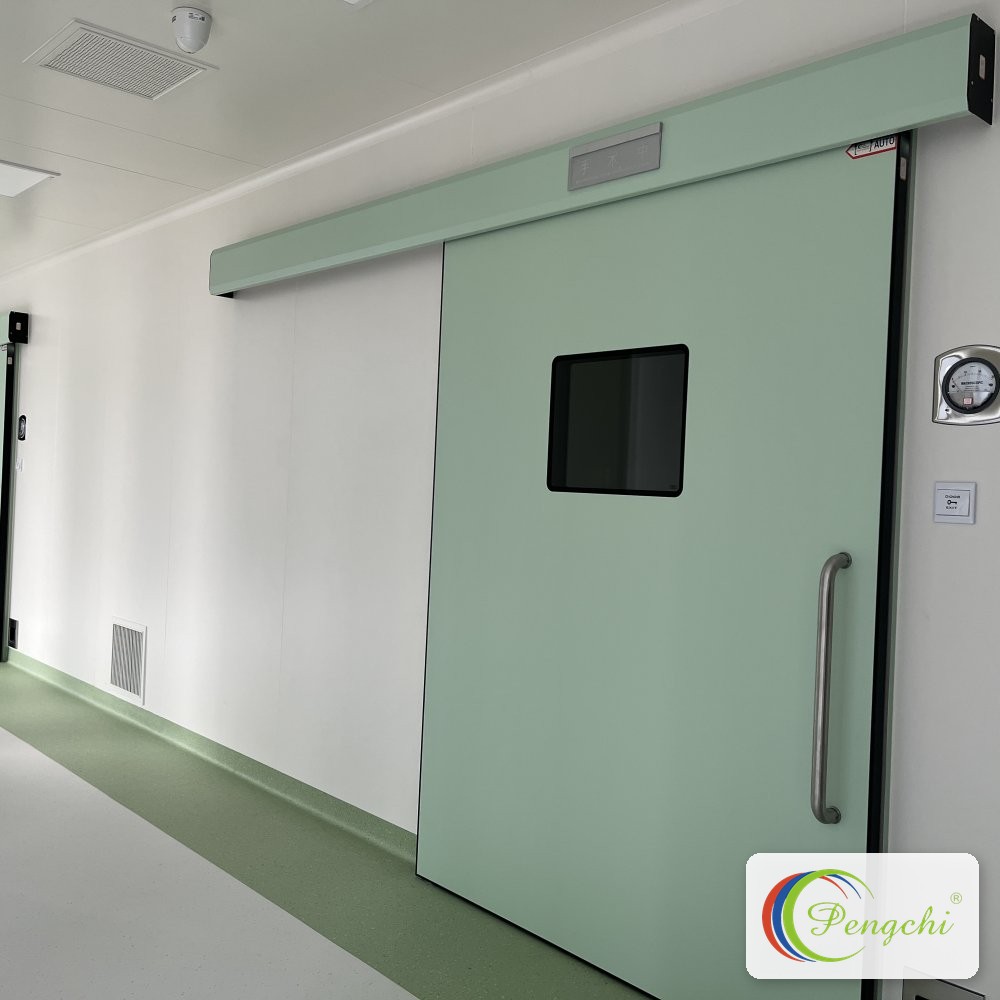 Automatic hermetic sliding door with tinted observation window and pressure gauge on the clean corridor of Shenzhen Aier Eye Hospital headquarters, supplied and installed by Pengchi.